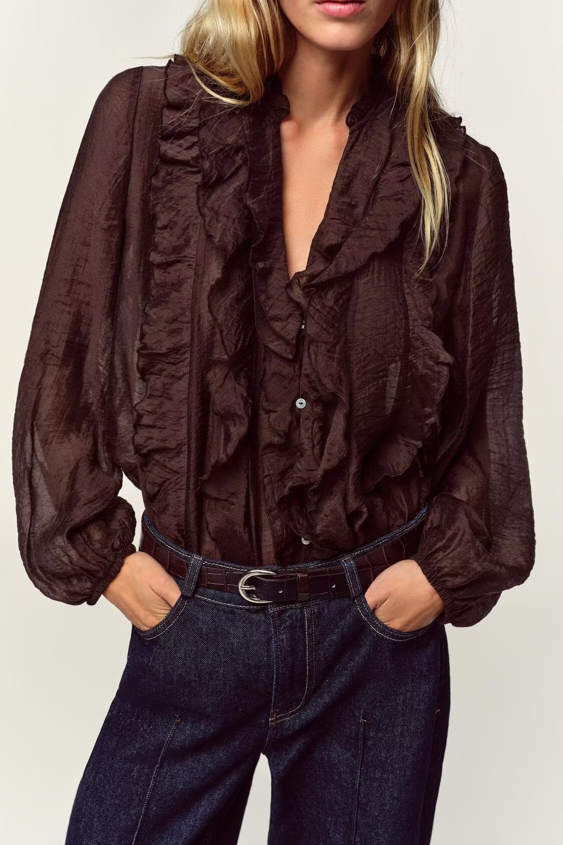 Women’s long sleeve autumn laminated shirt with decorative details, stylish fall clothing by Wanita Store.