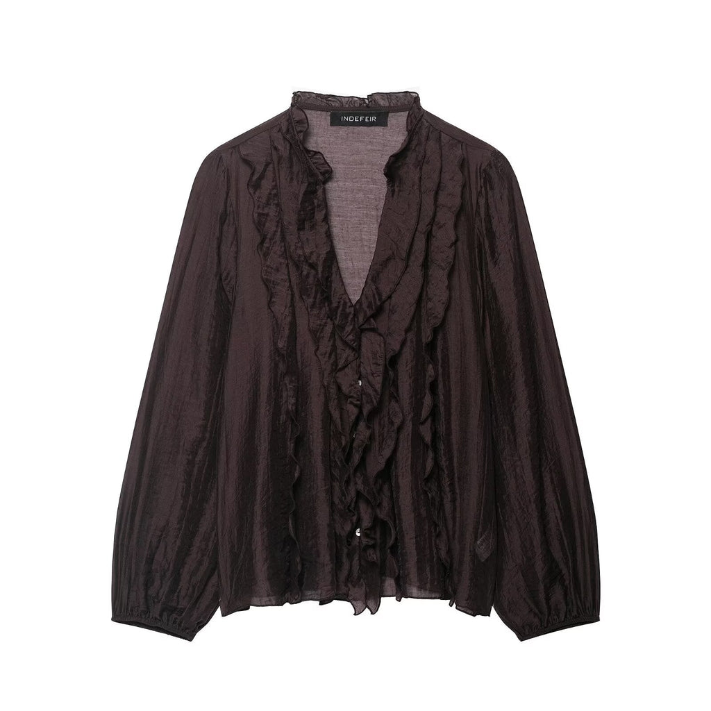 Women’s long sleeve autumn shirt with laminated decorative details, stylishly designed by Wanita Store.