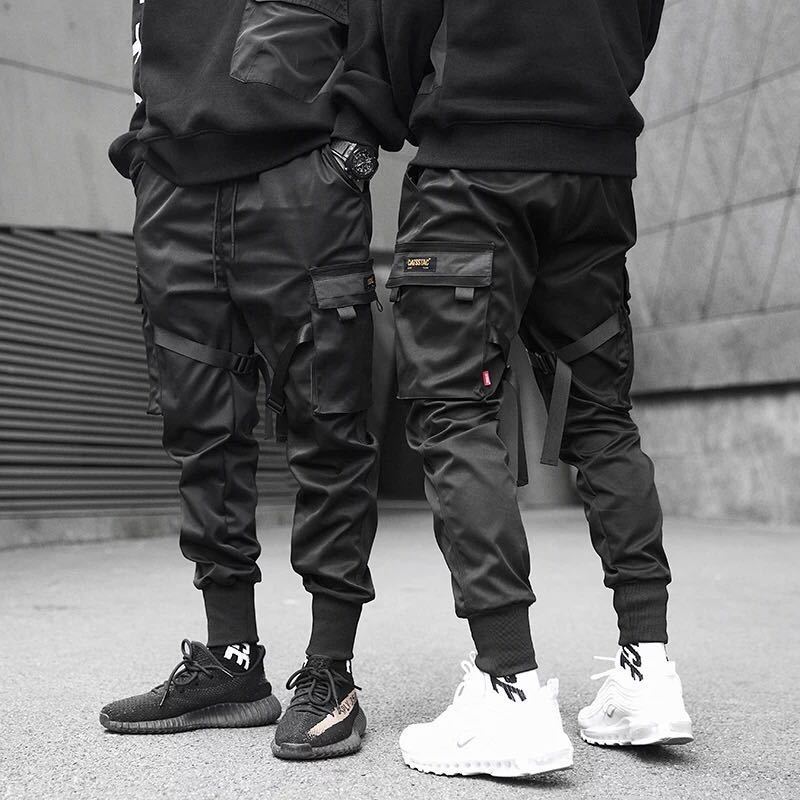 Niepce YE2032 matte black joggers sweatpants displayed on a model, showcasing their relaxed fit and comfortable design.