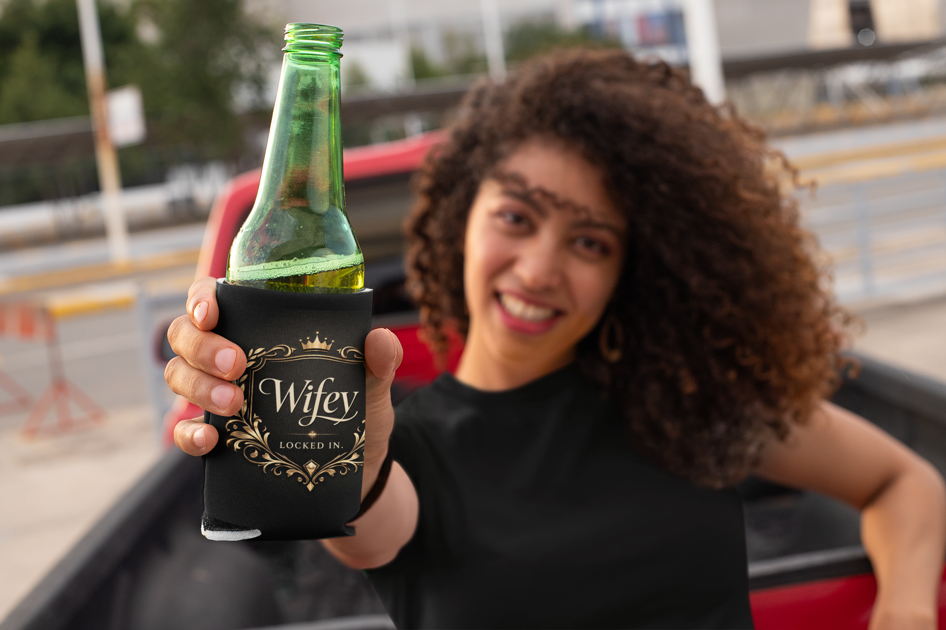 Black and gold "Wifey Locked In" wedding koozie with stylish design, perfect for bride gifts and engagement party accessories.