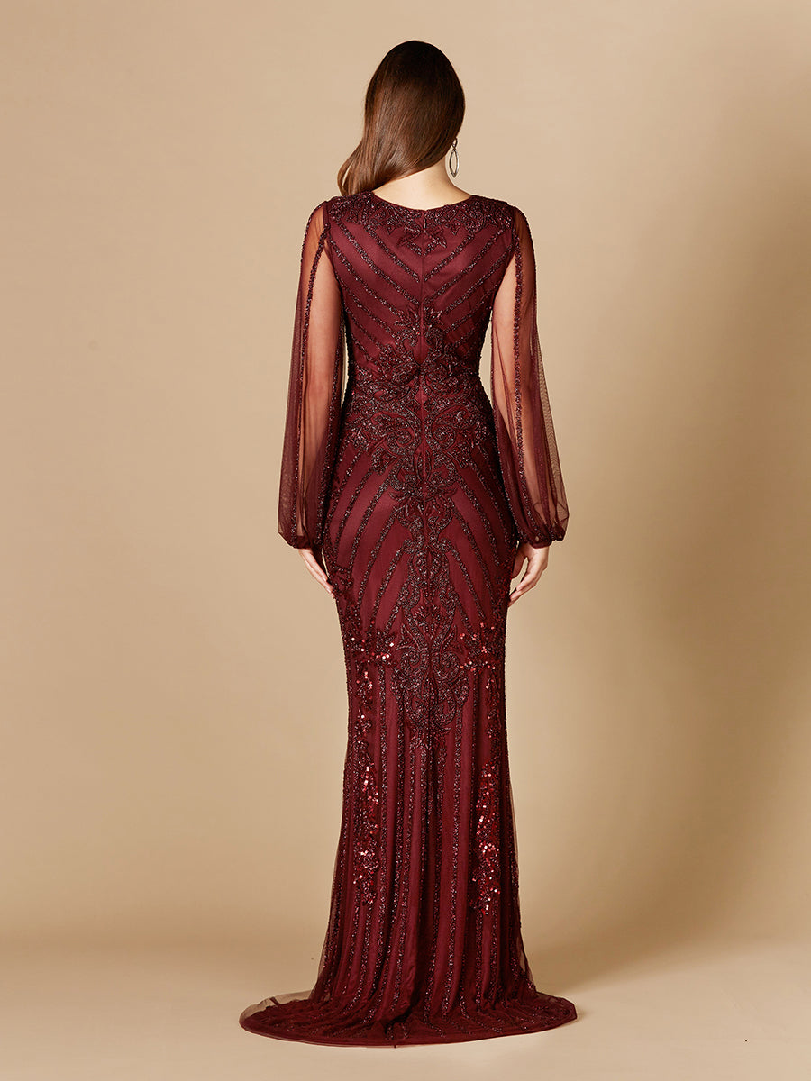 Lara New York long flutter sleeves beaded dress viewed from the back, showcasing flowing fabric and intricate bead detailing.