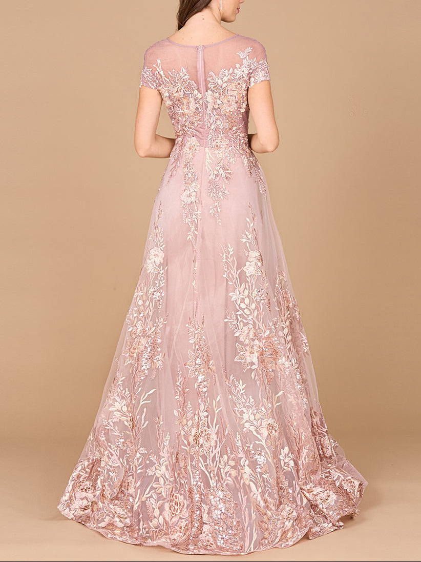 Lara New York lace applique A-line ball gown in dusty rose with intricate embroidery and flowing skirt, perfect for formal occasions.