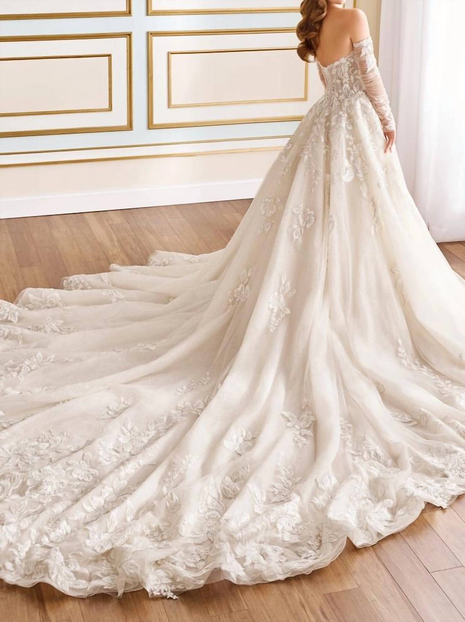 Elegant Amaryllis Ball Gown for women, wedding dress with a flowing design by Rack Hunt, displayed on a mannequin.