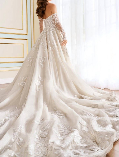 Elegant Amaryllis Ball Gown for women, wedding dress style with intricate details, designed by Rack Hunt.