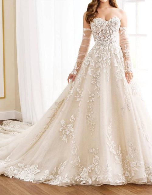 Elegant Amaryllis Ball Gown for women, featuring intricate details and a flowing silhouette, perfect for wedding occasions.