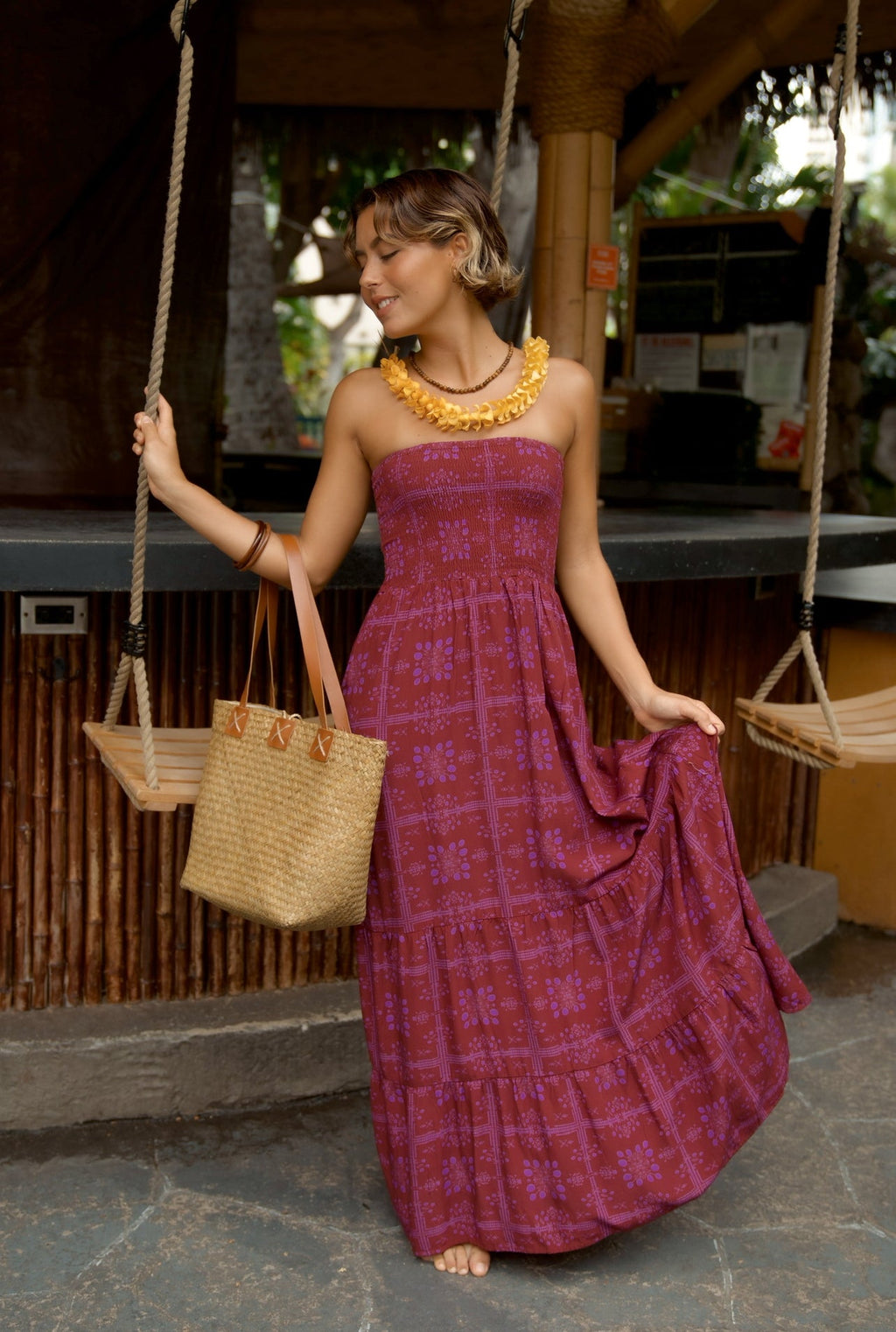 EHA Culture Mango Sunset Maile Dress displayed full view, featuring vibrant tropical print and flowing fabric.