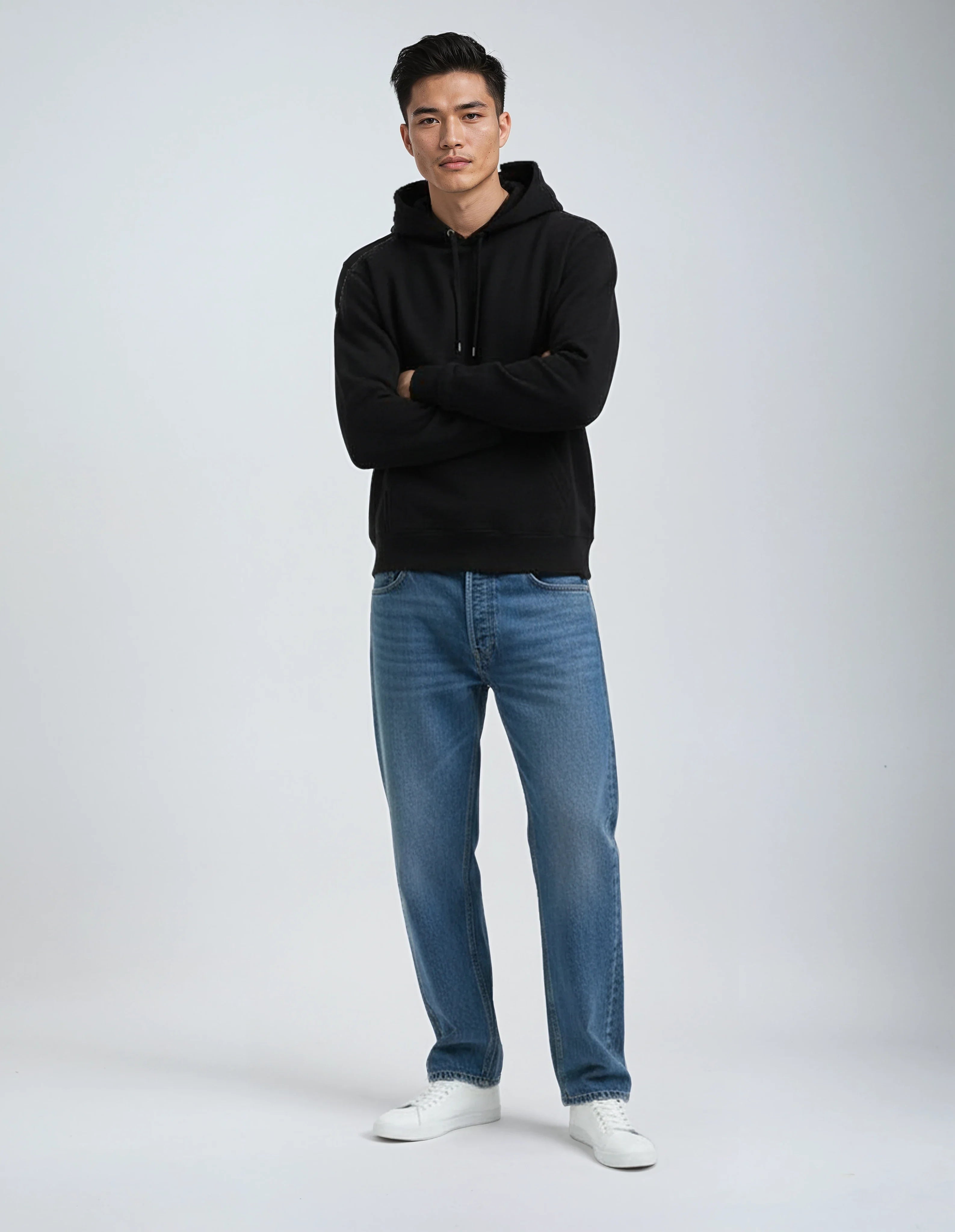 Black heavyweight fleece hoodie by SpectraUSA, full-body view showcasing the cozy, thick fabric and relaxed fit.