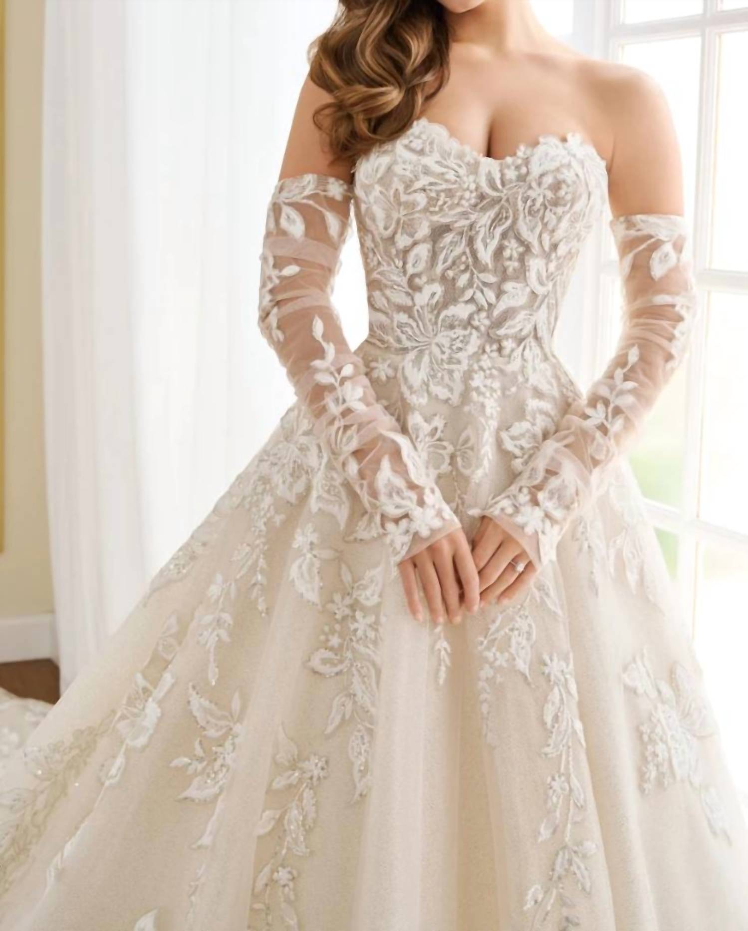 Elegant Amaryllis Ball Gown for women, wedding dress with flowing fabric and intricate details by Rack Hunt.
