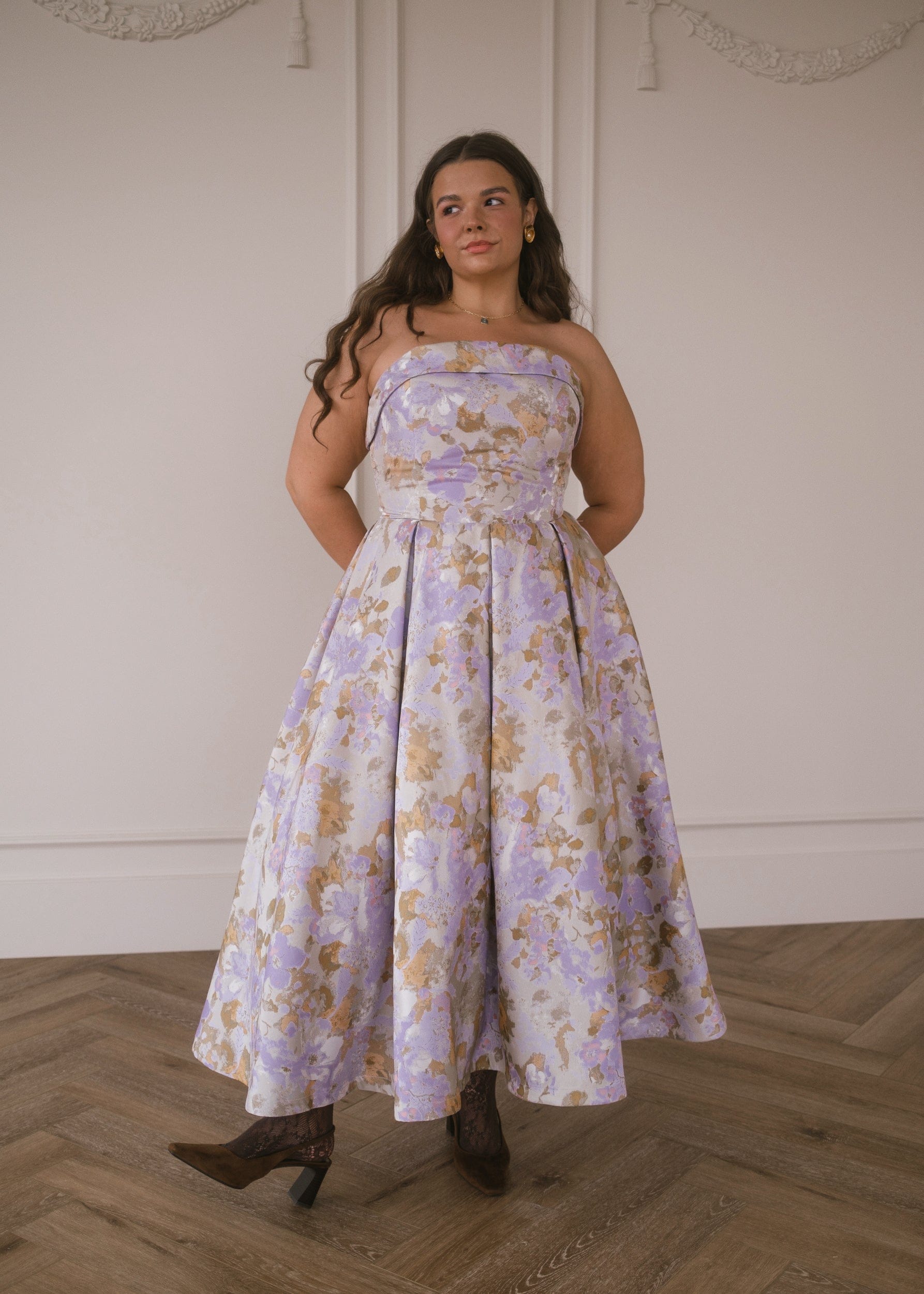 JessaKae Anastelle strapless jacquard dress with intricate pattern, fitted bodice, and flowing skirt, perfect for elegant occasions.