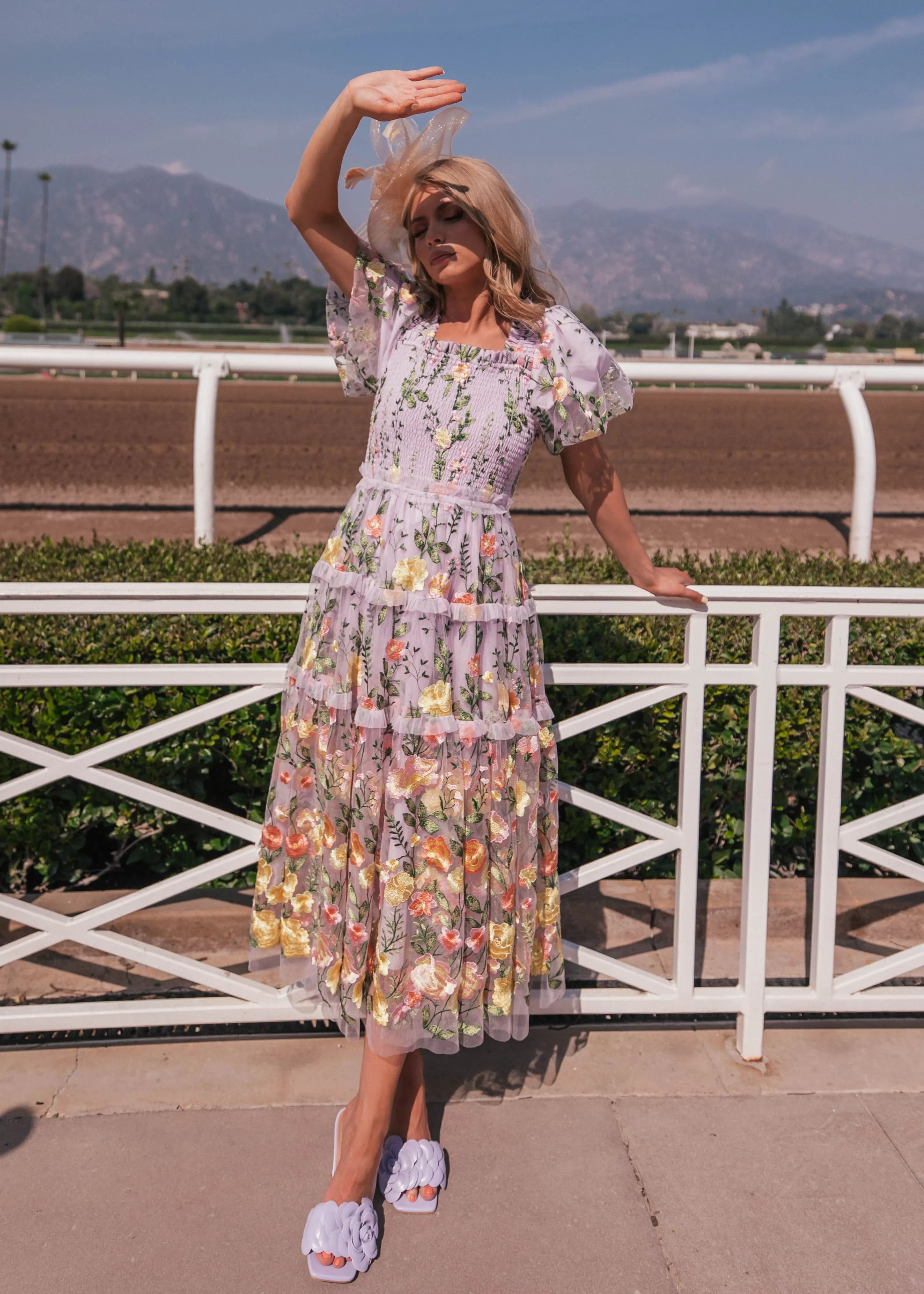 Lavender midi rose dress by JessaKae featuring a flowing fabric and elegant design, displayed on a model.