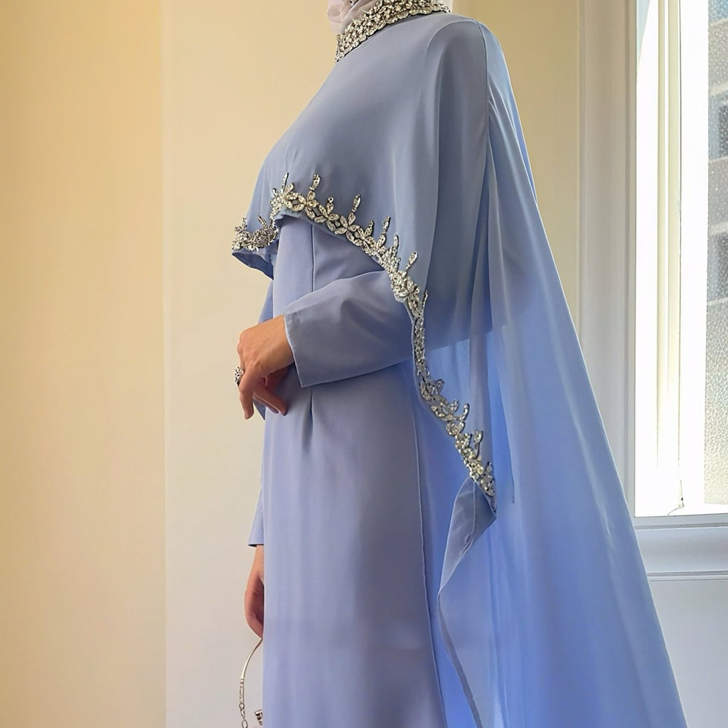 Celestial rhinestone cape abaya from Mariam's Collection, featuring luxurious embellishments and elegant modest design.