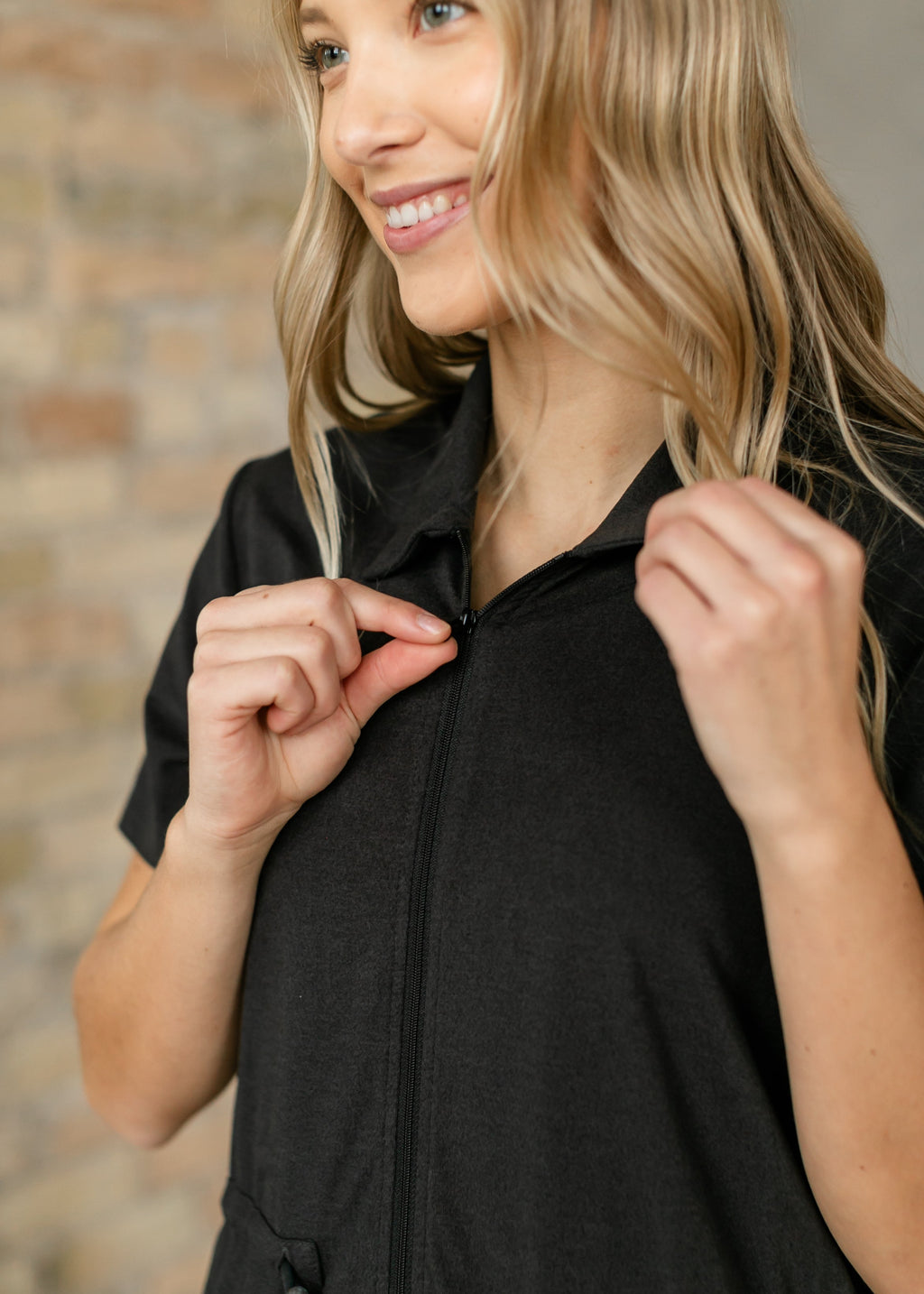 Inherit Co. Scout Athletic Midi Dress with zip front, sleeveless design, fitted silhouette, ideal for active or casual wear.