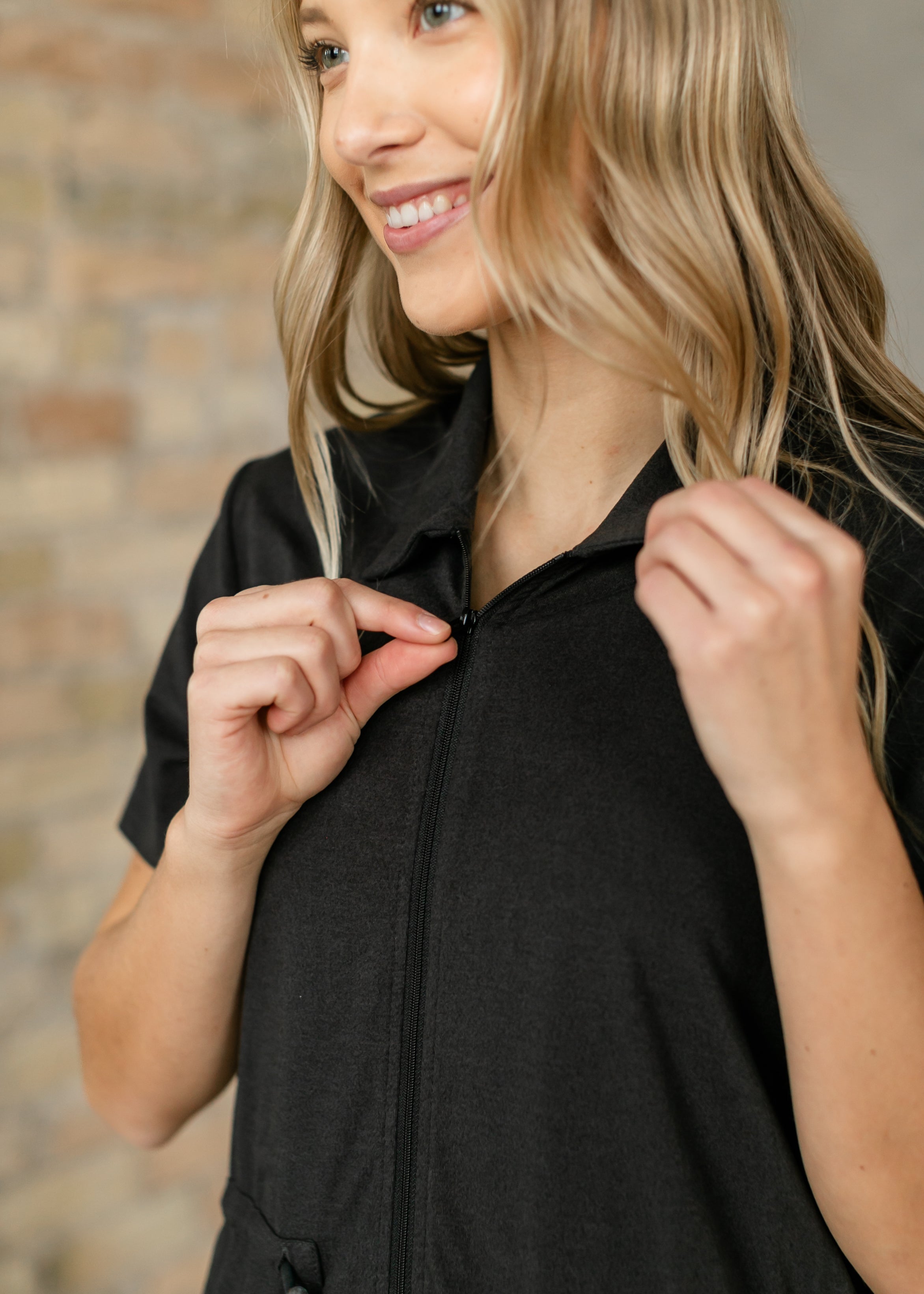 Inherit Co. Scout Athletic Midi Dress with zip front, sleeveless design, fitted silhouette, ideal for active or casual wear.