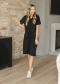 Black Heather Scout Athletic Midi Dress by Inherit Co. with zip front, casual and comfortable for active wear.