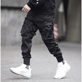 Matte black joggers by Niepce, sweatpants style with a sleek, modern design and comfortable fit, shown in a product image.